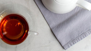 Earl Grey Rooibos in a Mug and Teapot on a Cloth