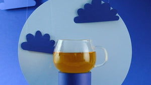 Best Teas for Sleep. Mug with Blue Background.